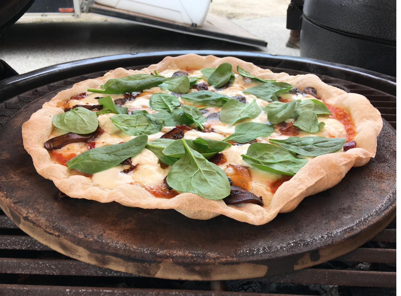 Sausage and roasted pepper pizza with fresh basil